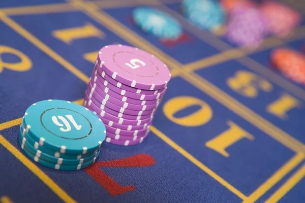 Baccarat table betting layout showing Player, Banker, and Tie betting positions